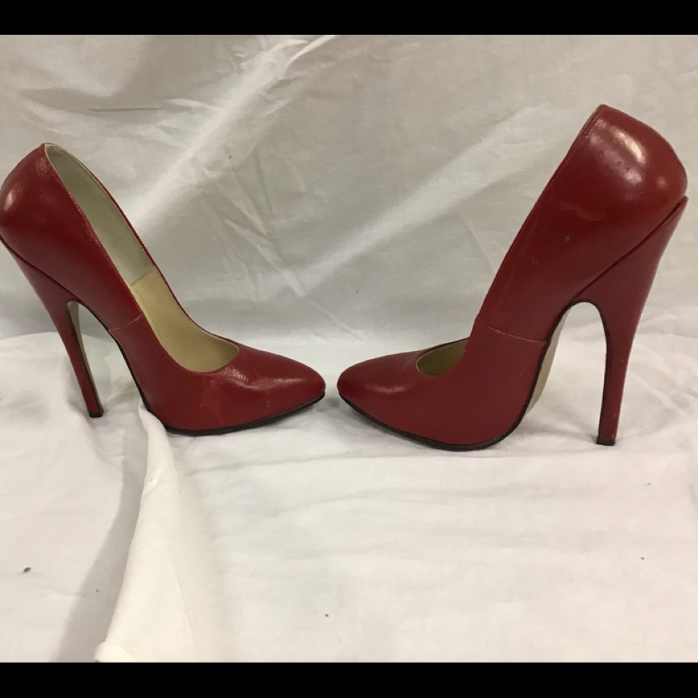 Red leather pumps